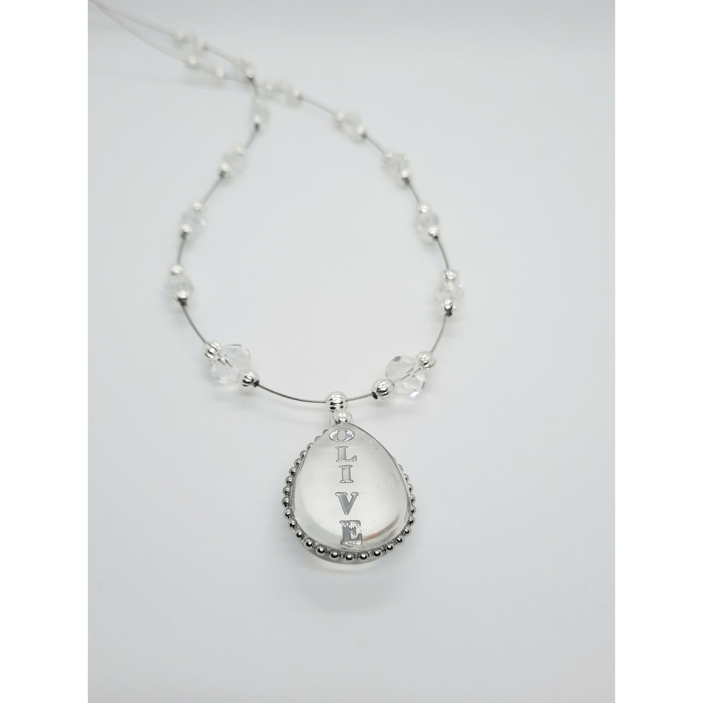 Argent Transparent Necklace ( Pendant takes up to 5 letters)